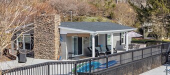 Charming lakefront retreat with spacious deck, private dock, and serene views—perfect for relaxation