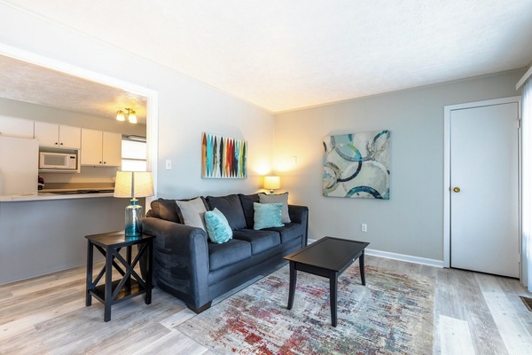 Relax on the plush sofa with chic decor and a warm, welcoming ambiance