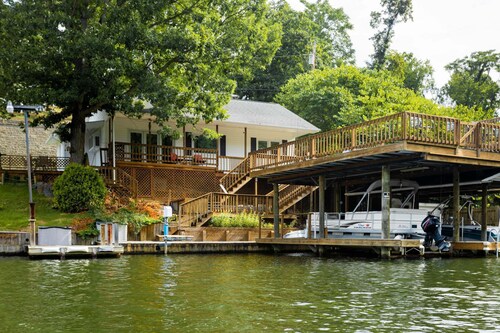 Escape to Sunset Cove, a serene lakeside retreat with modern comforts, stunning views