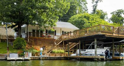 Escape to Sunset Cove, a serene lakeside retreat with modern comforts, stunning views