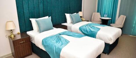 Luxury Room, City View | Desk, blackout drapes, iron/ironing board, free WiFi