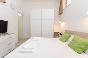 2 habitaciones, tabla de planchar con plancha y wifi gratis 