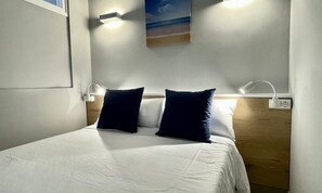 Iron/ironing board, bed sheets