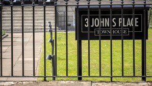 A town house with a black iron fence, a sign reading "3 JOHN'S PLACE," and a number "3" on the door. - 3 Johns Place Townhouse (Edinburgh)