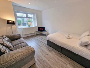 4 bedrooms, iron/ironing board, travel cot, WiFi