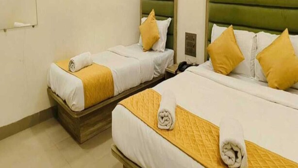 Deluxe Triple Room | Desk, laptop workspace, WiFi (free) - Hotel Pride Suites (Mumbai)