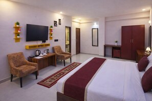 Habitación de lujo | Ropa de cama de alta calidad, cortinas opacas, sistema de insonorización