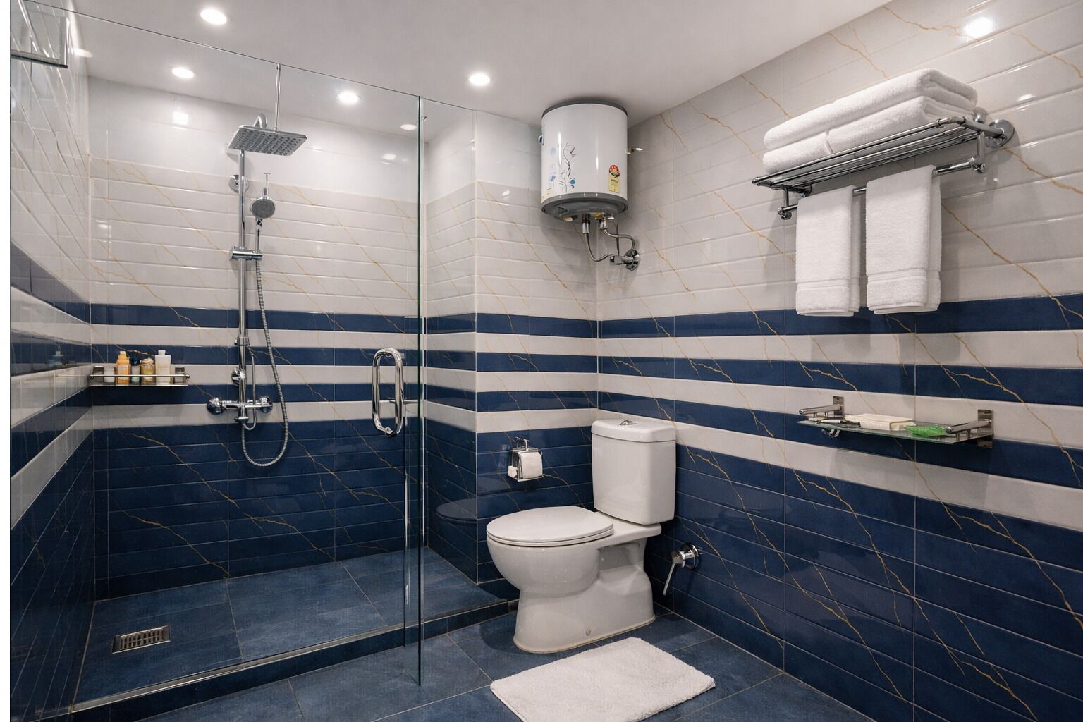 A modern bathroom with a glass-enclosed shower, a toilet, and a towel rack.
