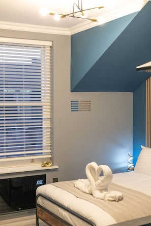 1 habitación, tabla de planchar con plancha, wifi y ropa de cama 