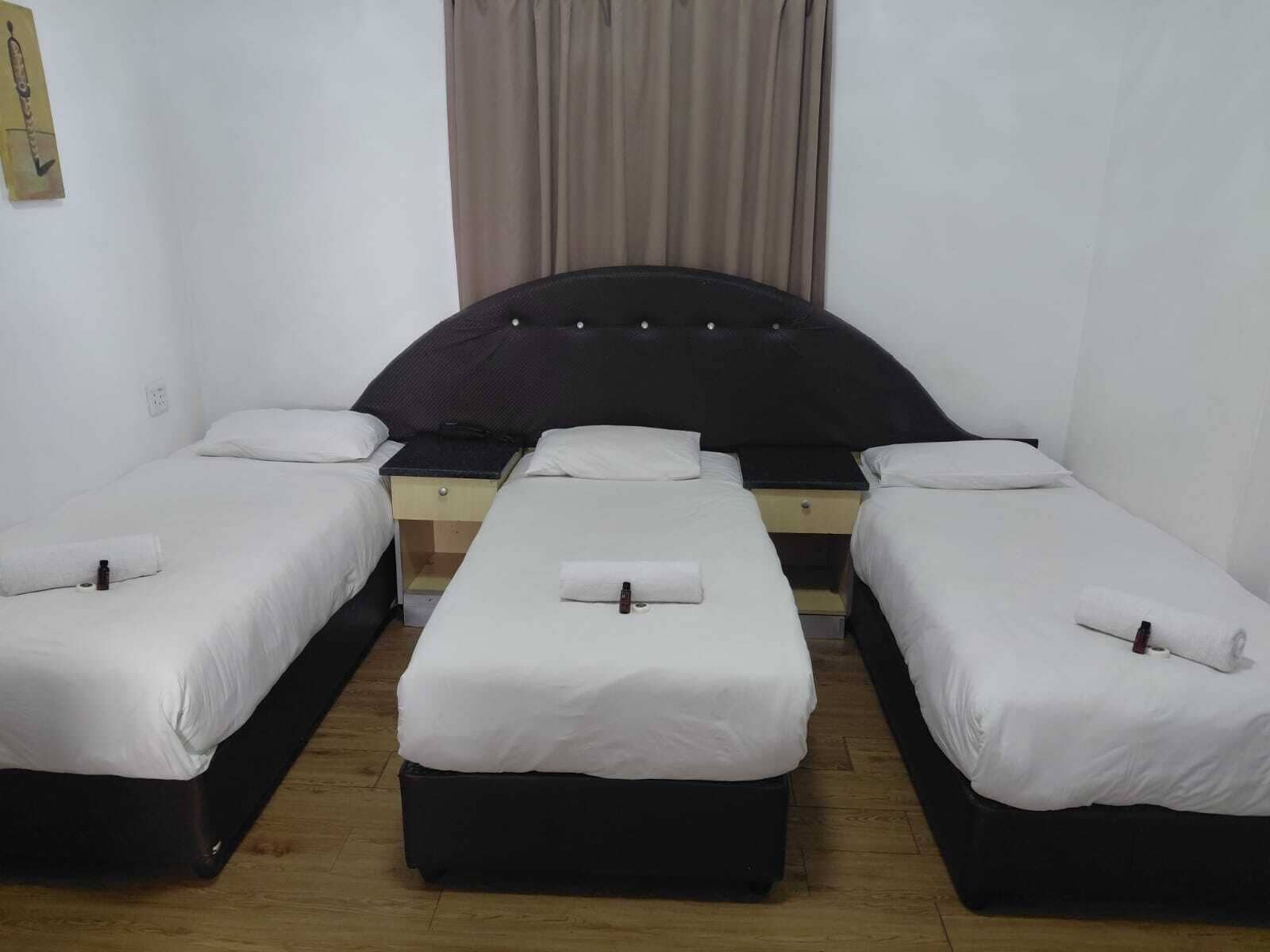 Family Room, Multiple Beds | In-room safe, desk, laptop workspace, blackout drapes