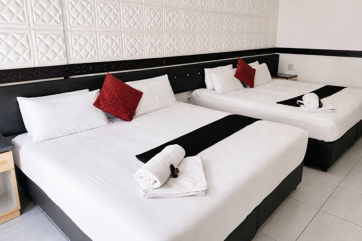 Family Quadruple Room | In-room safe, desk, laptop workspace, blackout drapes