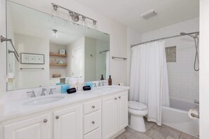 Shower, eco-friendly toiletries, hair dryer, towels