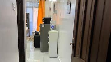 Deluxe Studio, City View | Private kitchen | Fridge, microwave, cookware/dishes/utensils