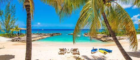 On the beach, sun-loungers, beach towels