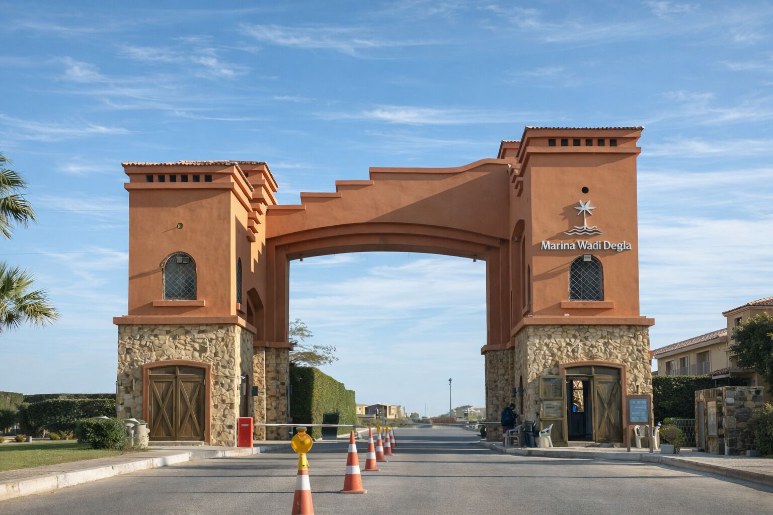A large archway with the sign "Marina Wadi Degla" at the top.