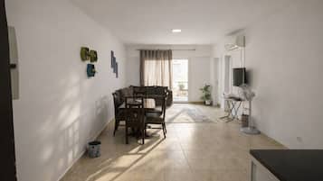 Standard Chalet, Balcony, Courtyard View | Living area | Flat-screen TV