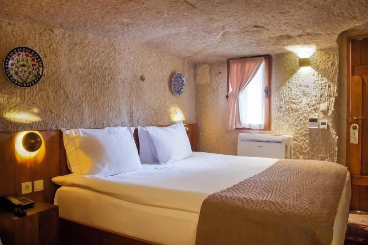 Premium bedding, memory-foam beds, minibar, in-room safe