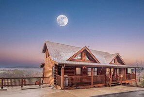Welcome to Moonlight Lodge, a Pigeon Forge log cabin near the Parkway. Your rental includes one private side of this duplex.