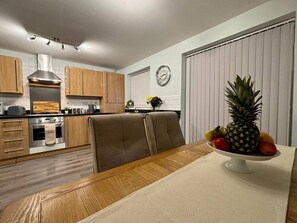 Fridge, microwave, stovetop, cookware/dishes/utensils