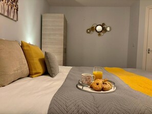 4 dormitorios, tabla de planchar con plancha, wifi y ropa de cama