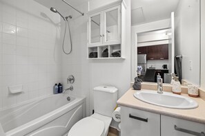 Hair dryer, towels, soap, shampoo