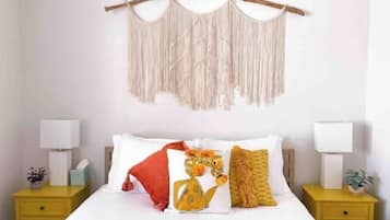 1 bedroom, desk, iron/ironing board, travel crib