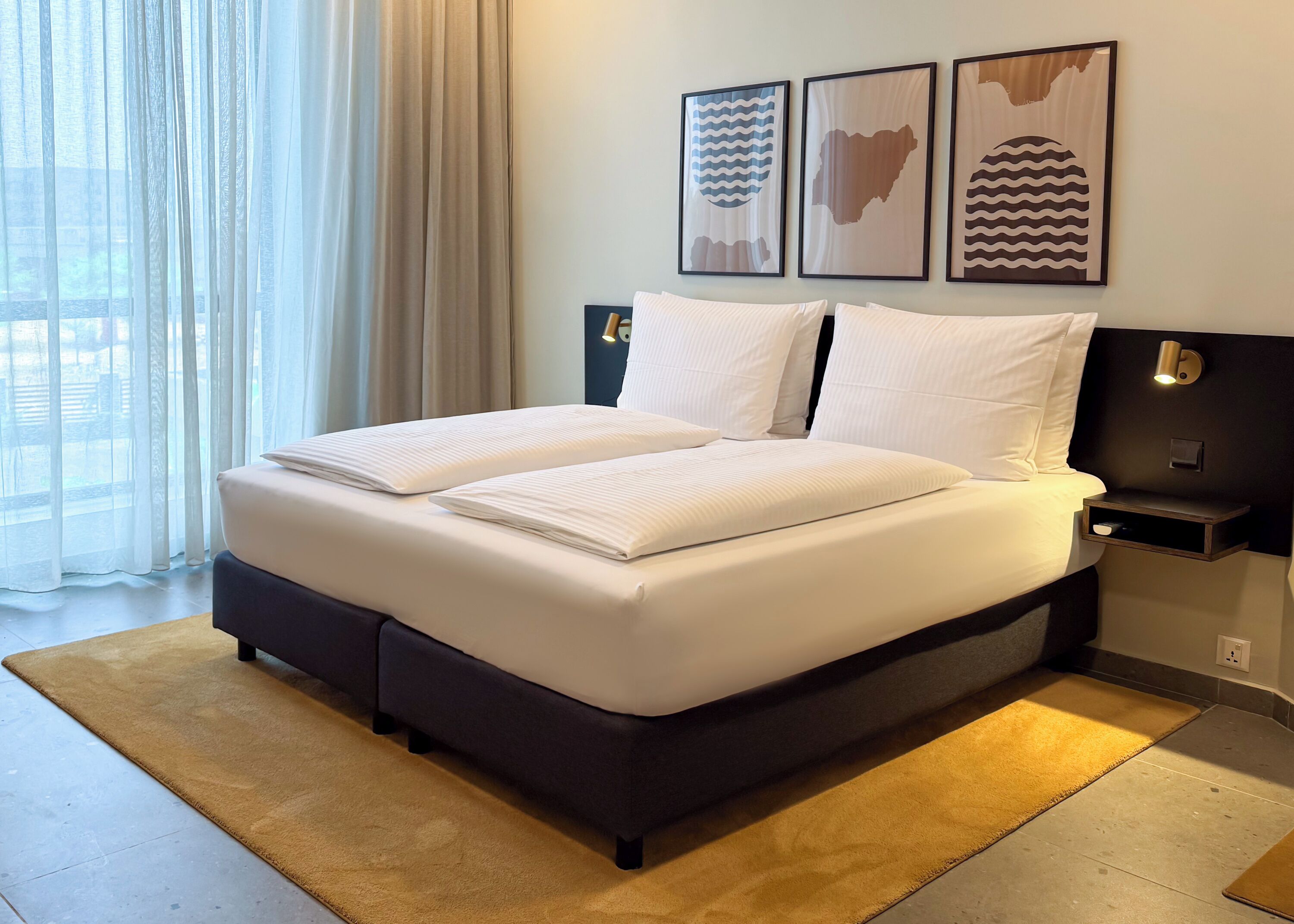 Premium bedding, in-room safe, blackout curtains, soundproofing