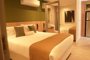 Apartamento galeria | Individualmente mobiliados, escrivaninha, Wi-Fi de cortesia