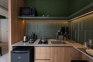 Traditional Apartment | Private kitchen | Coffee/tea maker, dining tables - Xtay Oslo Florianópolis (Florianópolis)