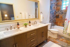 Hair dryer, towels, soap, toilet paper