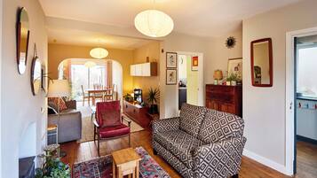 TV, fireplace, books