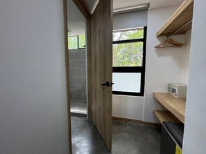 Comfort Triple Room, city view | Minibar, in-room safe, blackout drapes, iron/ironing board - Akela Park (Medellín)