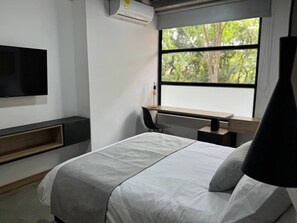 Comfort Room, City View | Minibar, in-room safe, blackout curtains, iron/ironing board - Akela Park (Medellín)