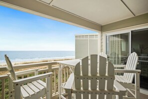 Terrace/patio - Beach Retreat: Oceanfront Upper Level Corner Unit Close to Community Pool (Oak Island)