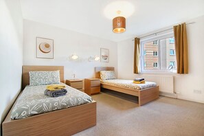 4 bedrooms, desk, iron/ironing board, travel cot