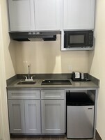 Quarto solteiro elite, cozinha americana | Cozinha americana privada | Geladeira, micro-ondas