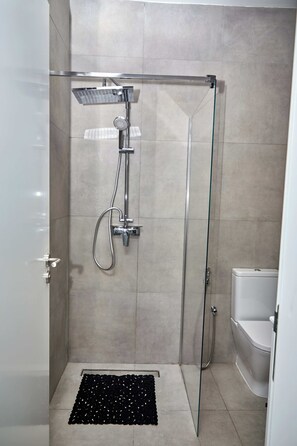 Double Room, Partial Sea View | Bathroom | Shower, towels, toilet paper