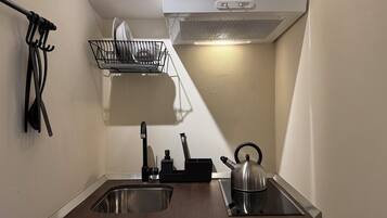 Fridge, microwave, stovetop, coffee/tea maker