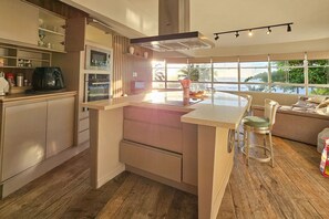 Apartment | Private kitchen | Full-size fridge, microwave, oven, stovetop