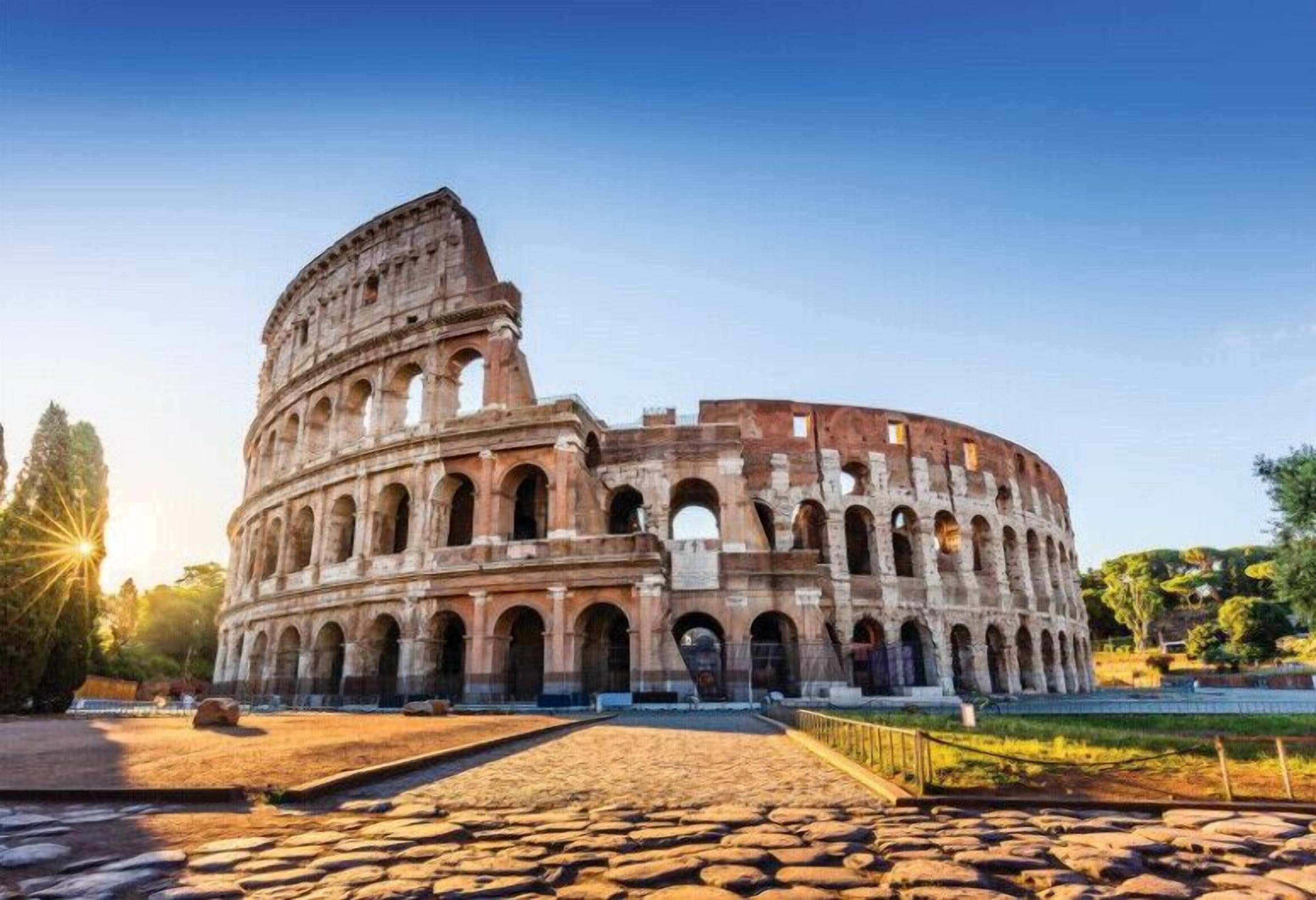 The Colosseum with its iconic arches and ancient structure.
