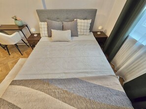 2 chambres, fer et planche à repasser, Wi-Fi, draps fournis