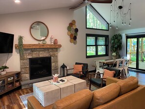 Smart TV, fireplace, books