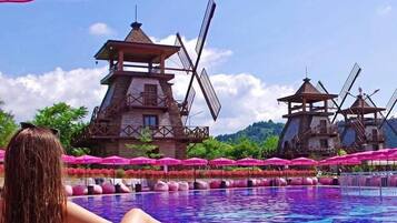 Seasonal outdoor pool, open 9:00 AM to 8:00 PM, free cabanas