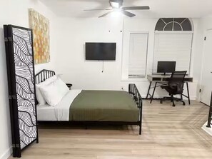 4 bedrooms, desk, iron/ironing board, travel cot