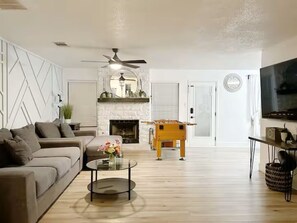 Smart TV, fireplace, table football, offices