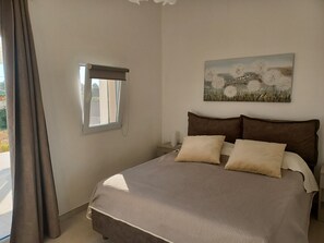 1 dormitorio, tabla de planchar con plancha, cuna de viaje y wifi gratis