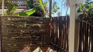 Unclassified image, 5 of 6, button - Charming bungalow in garden with lot of privacy - in an exclusive condo. (Guajiru Trairi)