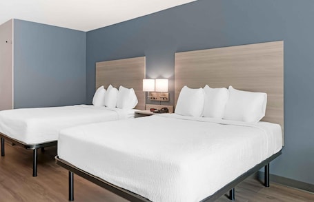 Desk, laptop workspace, free WiFi, bed sheets