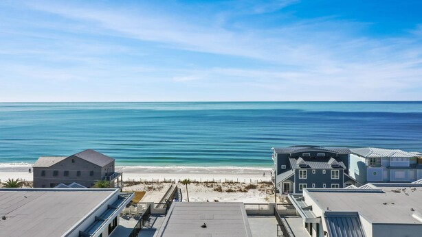 A coastal hotel with a view of the beach and ocean. - Club at Mexico Beach 1K Forgotten Cove (Port St. Joe)