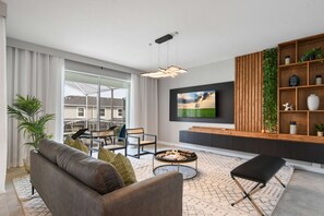 House, Multiple Beds, Pool Access (9139SHD CG) | Living area | MP3 dock - Championsgate 6BR Luxury Home Pool Spa Near Disney (Davenport)